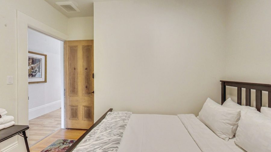 The White room is down the hall with the door on the right before the first bathroom.   It's small and cozy but quiet and comfortable. 