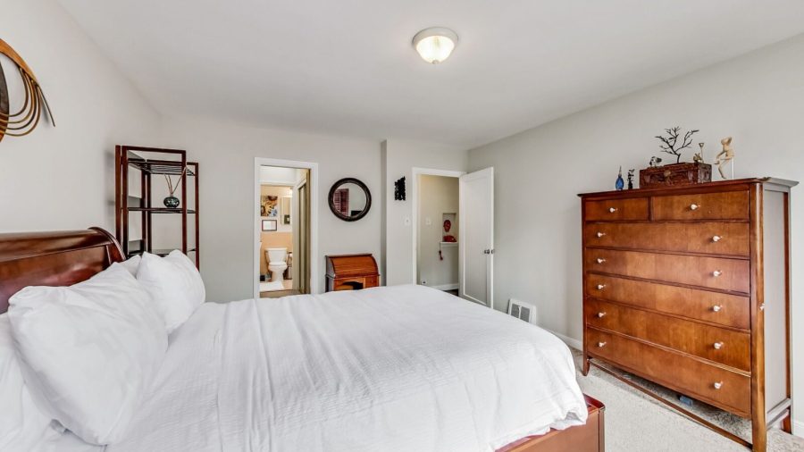 Master Suite "J" with a queen-sized bed and en suite full bathroom...