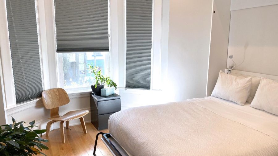 Business-ready smaller room also faces Castro St with DISH Network TV - need a desk? Just flip up the bed :-)