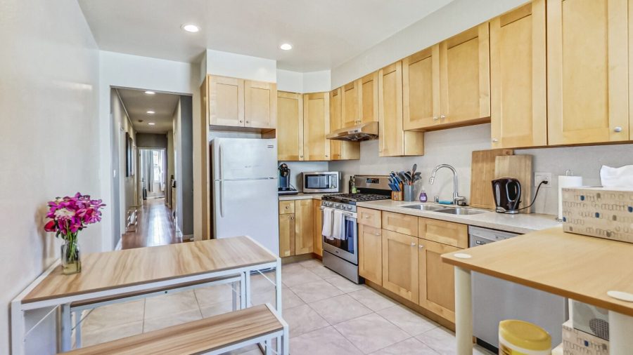 Well appointed kitchen with a dining table for 4.  We provide coffee, tea, sweeteners and dishwasher pods.