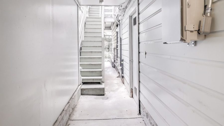 The first door on the right gets you into the garage where the laundry is.  just past the laundry is your private oasis.