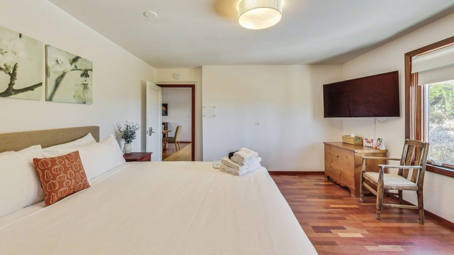 Bay View Bedroom Features Large TV and Roku