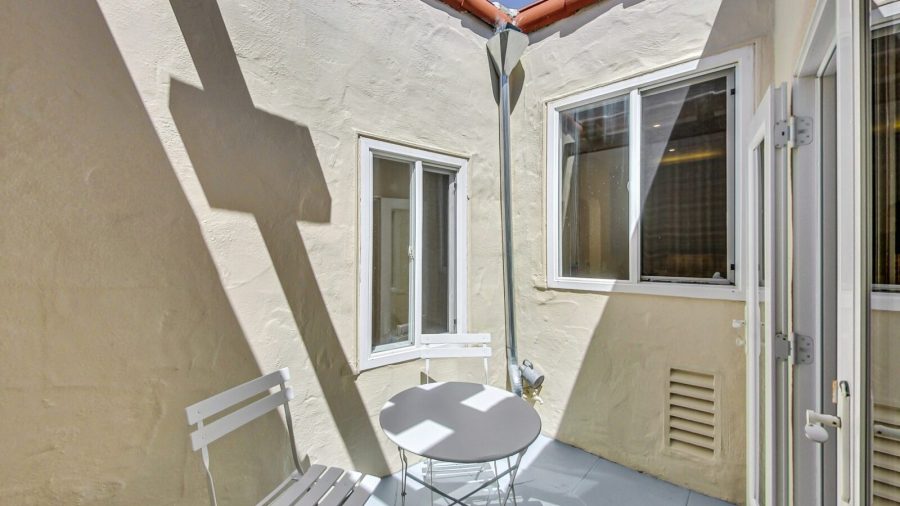 Interior atrium perfect for morning coffee.  enjoy sunshine without leaving the house.