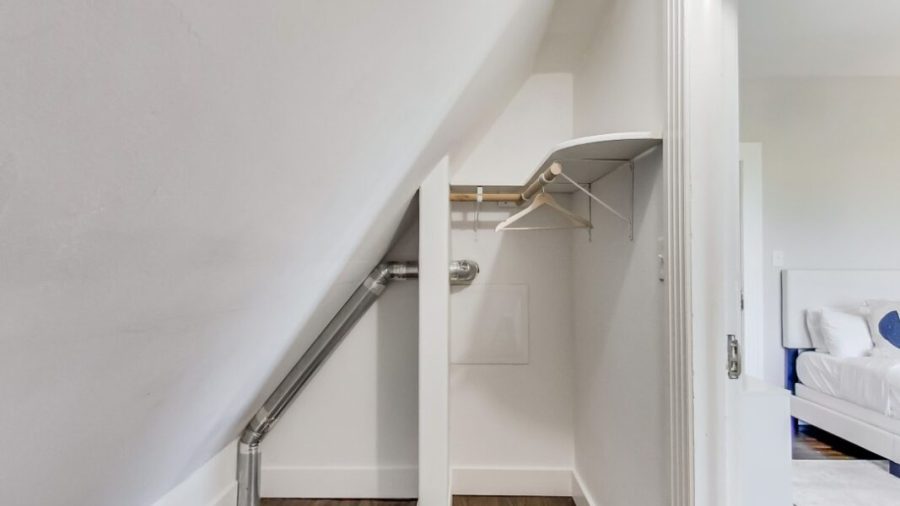 The front bedroom upstairs has a full bed and plenty of closet space