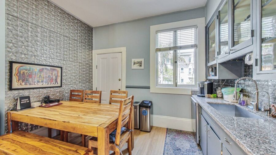 Dining table in the kitchen area (the laundry room is behind that door)