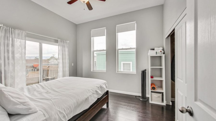 This is the medium sized bedroom but it has lots of light and a sliding door that leads out to the back deck. 