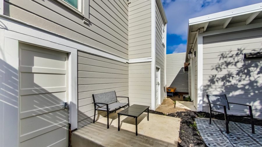 Back yard area is shared with the back cottage.