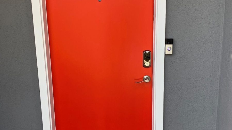 The front door features keyless entry and a video doorbell