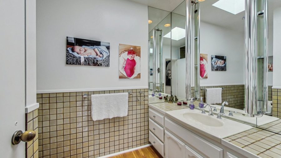 Main floor bathroom.  Large vanity and shower stall. 