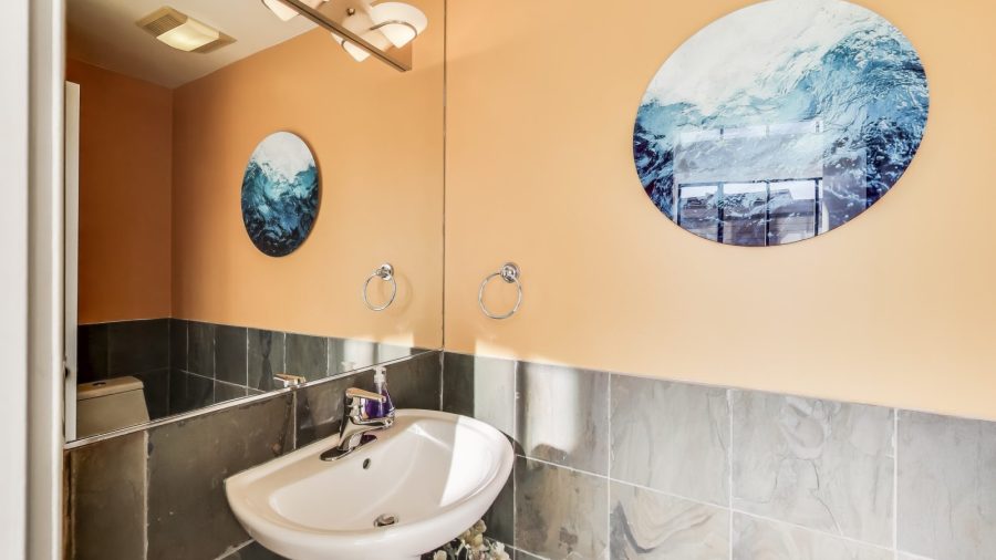 There's a half bath located upstairs, off the entry hallway