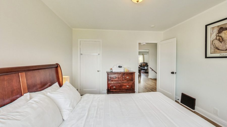 First bedroom right off the bathroom.