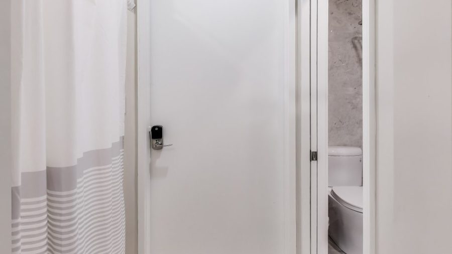 The entry door from the inside, . Bathroom is right by the entrance. 