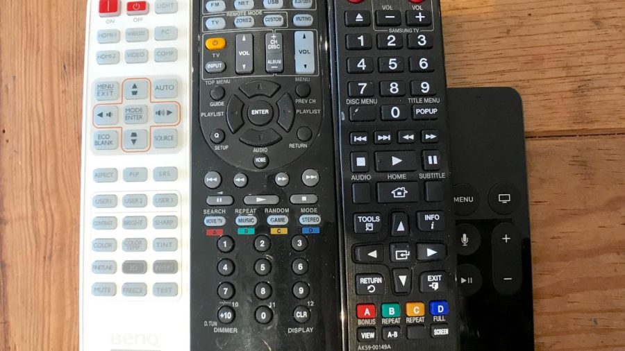 The projector has surround sound, an Apple TV, and a DVD/VCR box