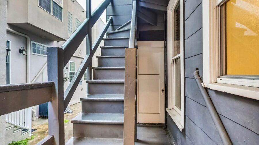 Back stairs lead to laundry are.