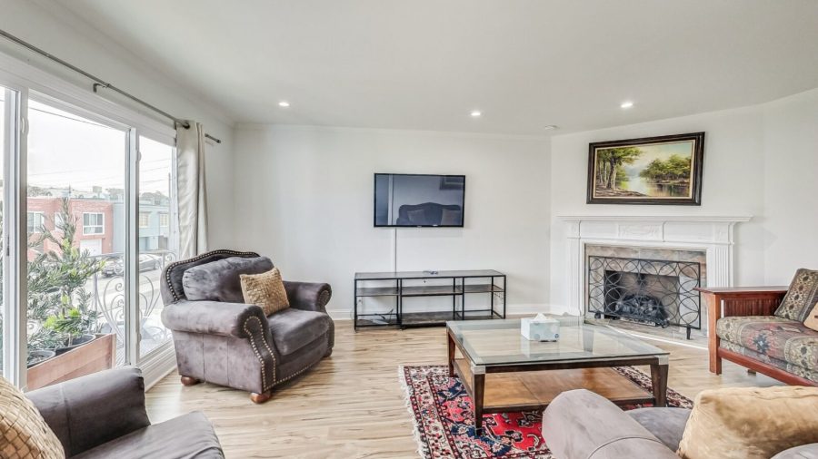 the spacious living room on the upper level