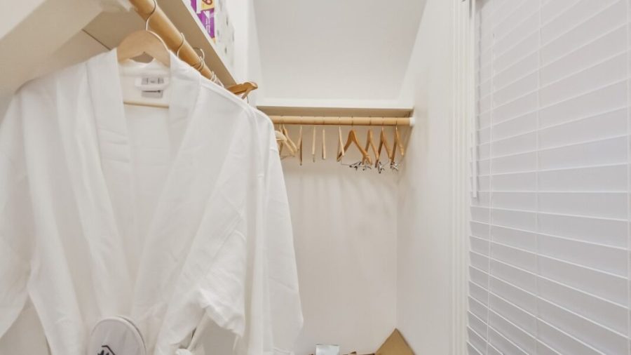 Main level bathroom closet.  The box has some house restock items in it in case you run out of shampoo or other consumables.