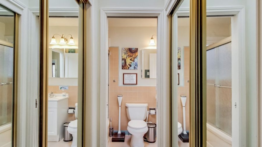 Private closets line the path to your en suite full private bath with tub and shower.