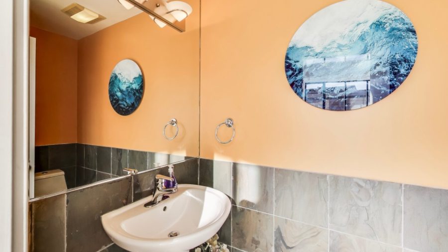 There's a half bath located upstairs, off the entry hallway