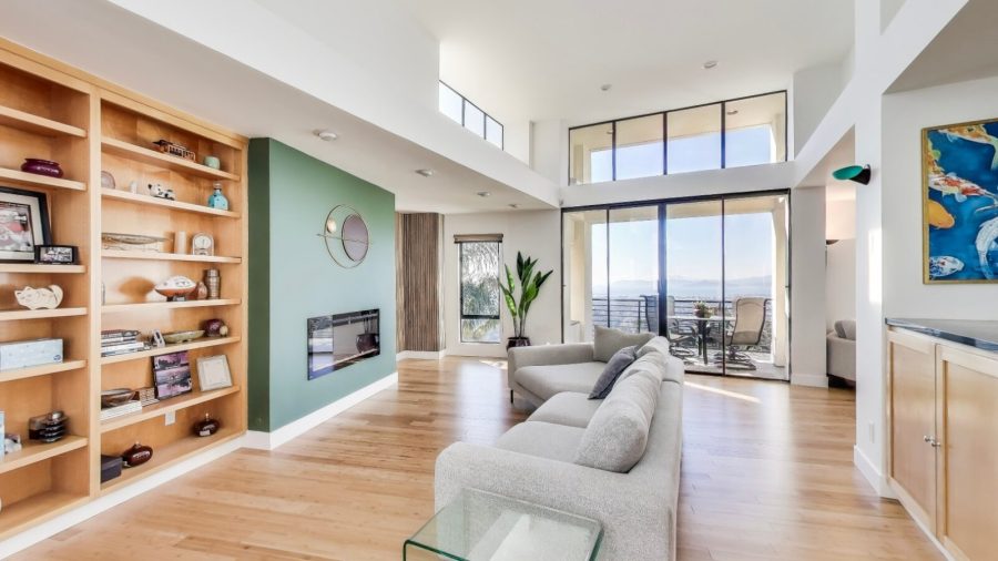 There is a patio located off the living room and family room