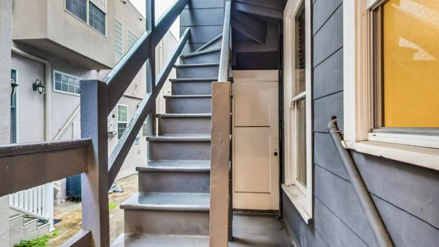 Back stairs lead to laundry are.