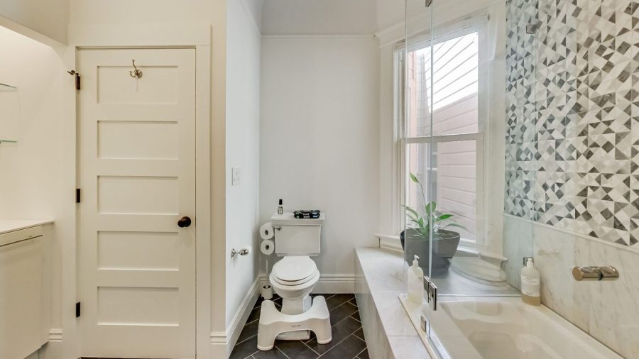 Inside the Master Bedroom Suite... Master bathroom with shower, tub and generously sized  double-sink vanity...