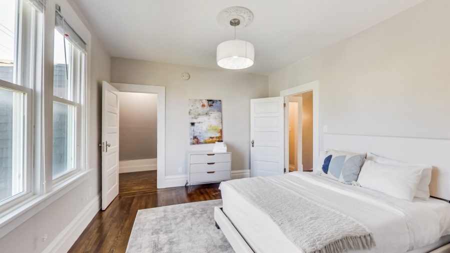 The front bedroom upstairs has a full bed and plenty of closet space
