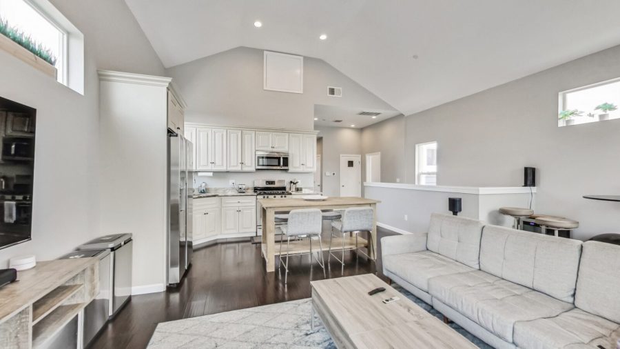 Open concept living room, dining room, and kitchen
