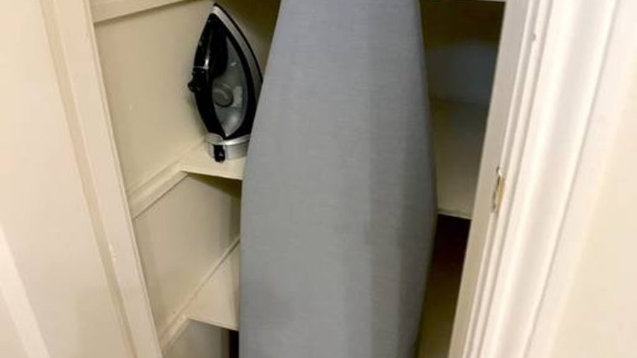 Full size ironing board with iron...