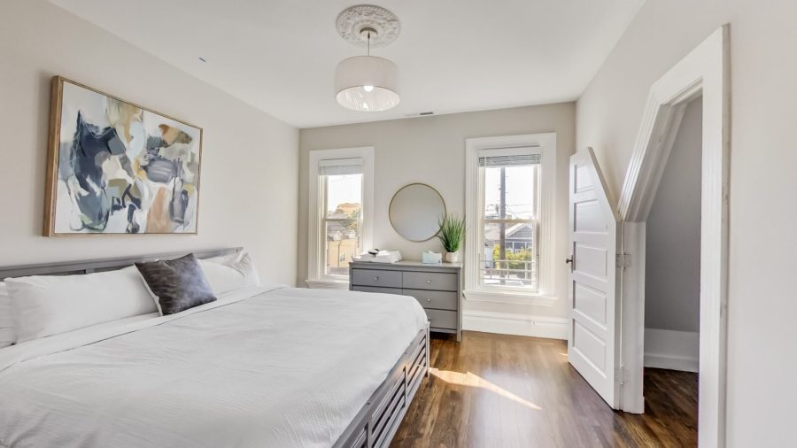 Upstairs middle bedroom features a king bed and large closet.
