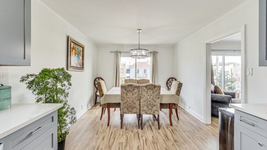 Dining area in upper level with open concept kitchen