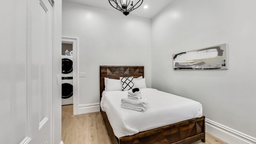 2nd bedroom is off the laundry machines and full bathroom.