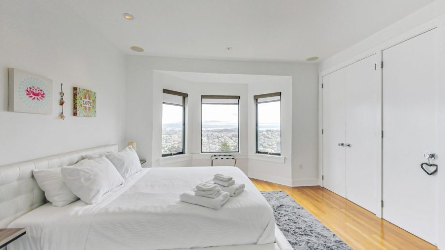 Main floor queen bedroom with en suite bath. and city view.