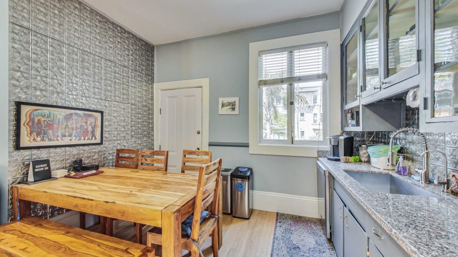 Dining table in the kitchen area (the laundry room is behind that door)