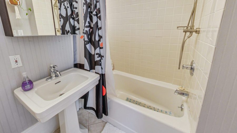 The far back bathroom has a tub if you want to soak or a traditional shower over tub  with Kiehl's bath products for a refreshing shower.
