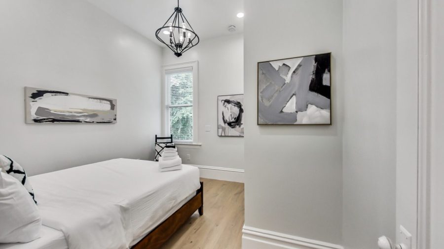 2nd bedroom is off the laundry machines and full bathroom.