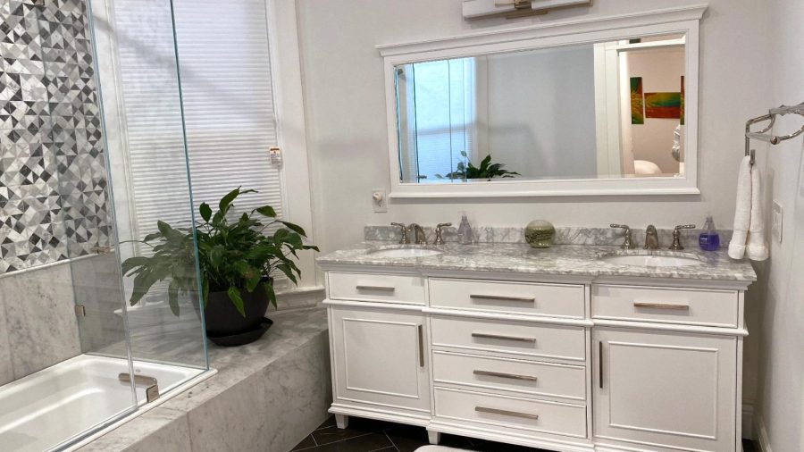 Private Master Suite en suite full bathroom with double vanity, shower and tub...