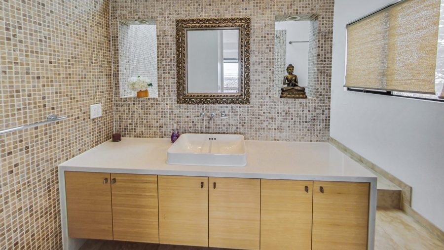 Main floor bedroom ensuite bathroom 
Large vanity and shower over soaking tub