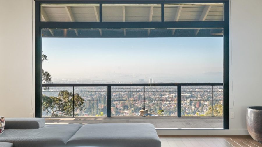 Bay views for miles from the massive living room picture window.  This window features motorized shades, please use the white remote control wall-mounted to the left of the window.
