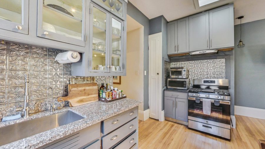 Bright, open full kitchen.  It's cozy but has everything you need to cook your own meals. 