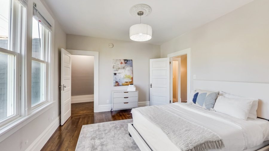 The front bedroom upstairs has a full bed and plenty of closet space