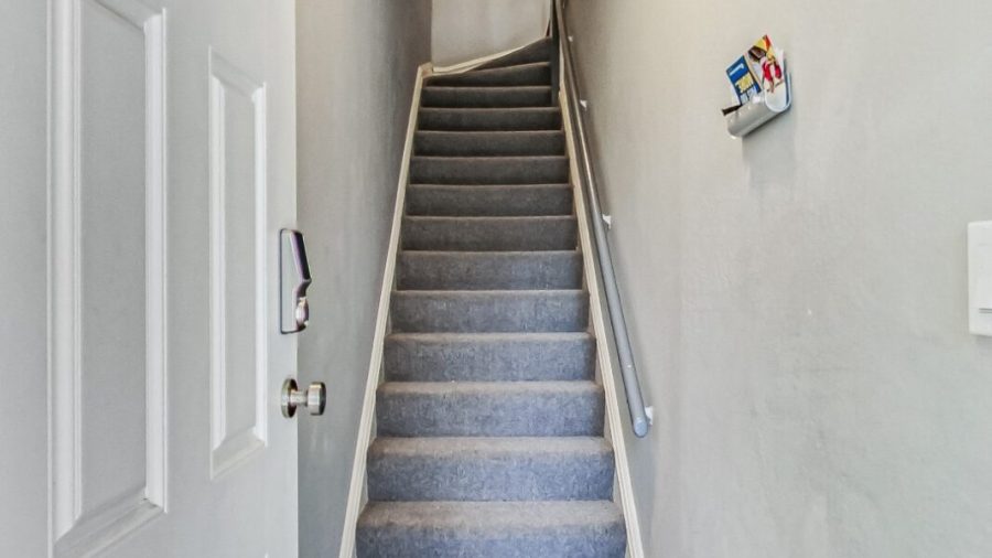 there is a shoe rack at the entry for you.  Please remove shoes and ascend up the flight of stairs to the 4 bedroom 2 bath flat.