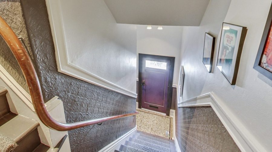 Enter the purple door.. Atop the stairs and first door on the right to the Purple room.
