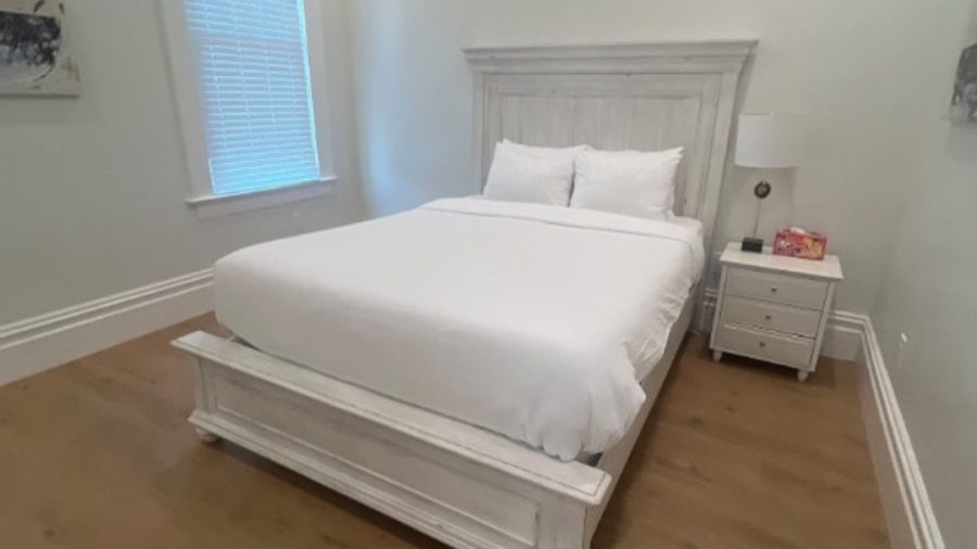 Master bedroom has a queen bed and en suite bathroom.
