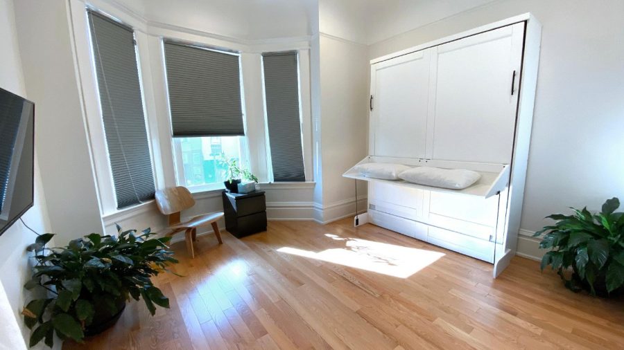 Business-ready smaller room also faces Castro St with DISH Network TV - need a desk? Just flip up the bed :-)
