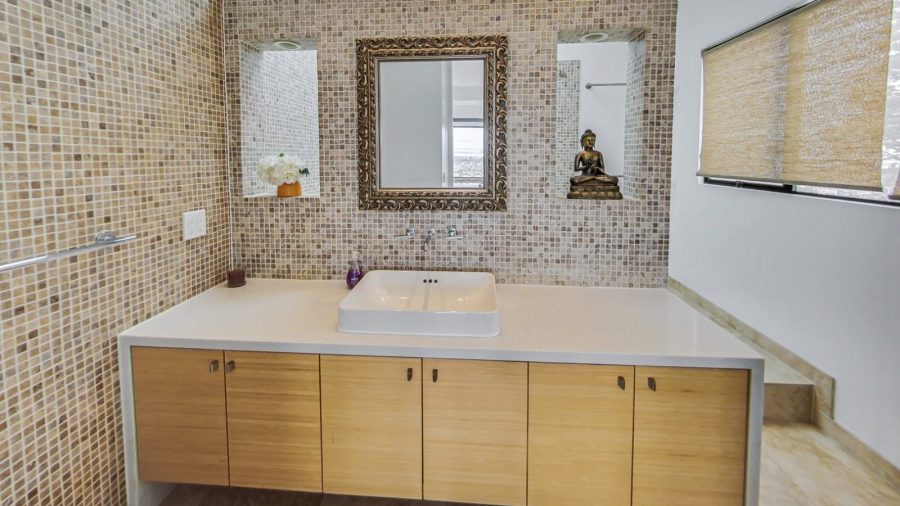 Main floor bedroom ensuite bathroom 
Large vanity and shower over soaking tub