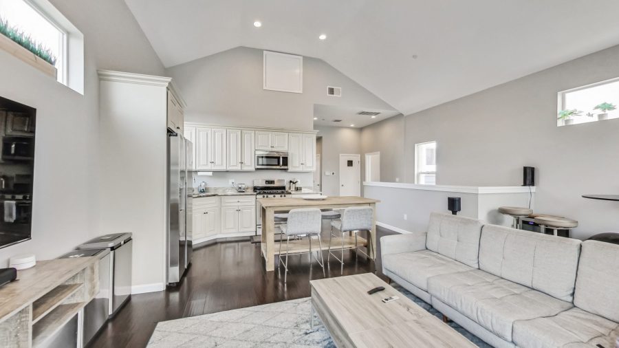 Open concept living room, dining room, and kitchen
