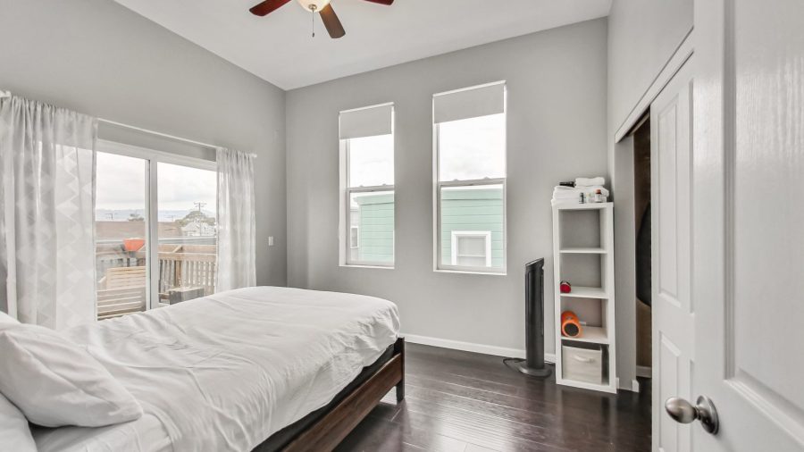 This is the medium sized bedroom but it has lots of light and a sliding door that leads out to the back deck. 