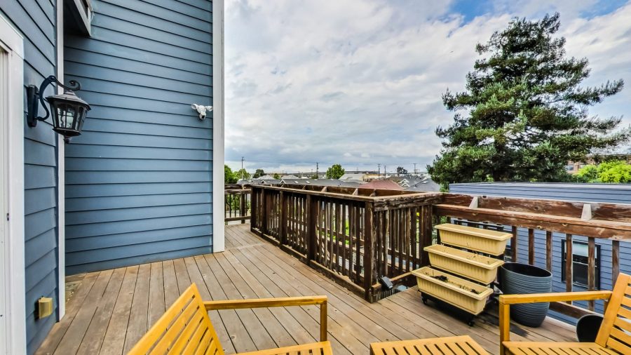 Back deck. Perfect for the morning coffee or an evening nightcap.  The wether is almost always perfect in West Oakland.