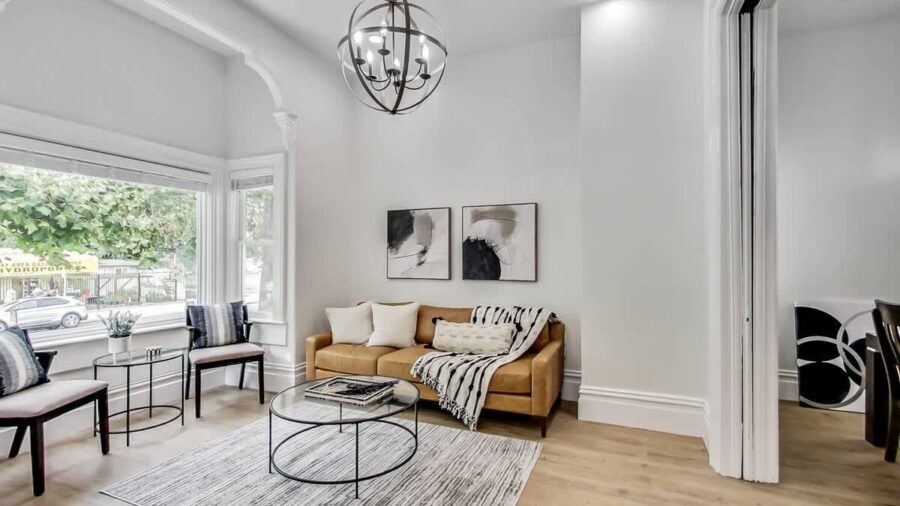 Spacious living room with space to gather, enjoy a beverage or watch tv.