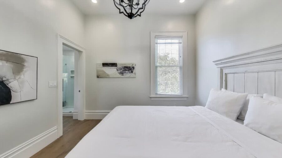 Master bedroom is off the kitchen.